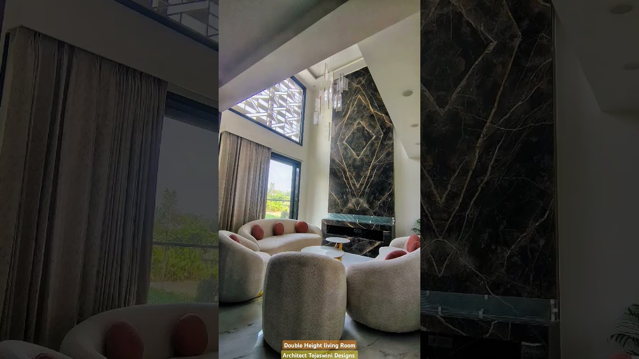 Double Height Living Room Design with Bookmatch | ATD | Best Architects in Noida & Greater Noida