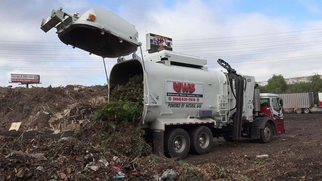 Mack LR Amrep on Route and unloading