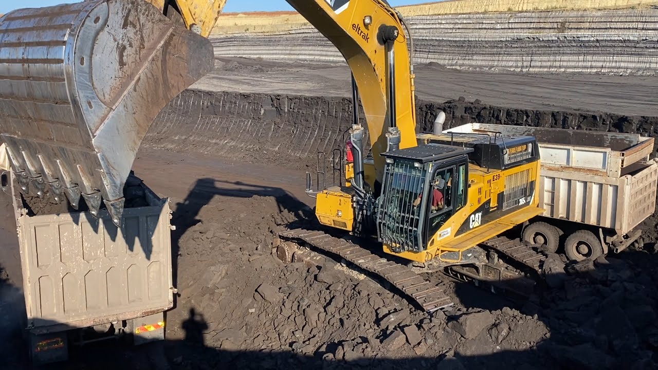 Caterpillar 365C Excavator Loading Trucks With Coal - Interkat SA