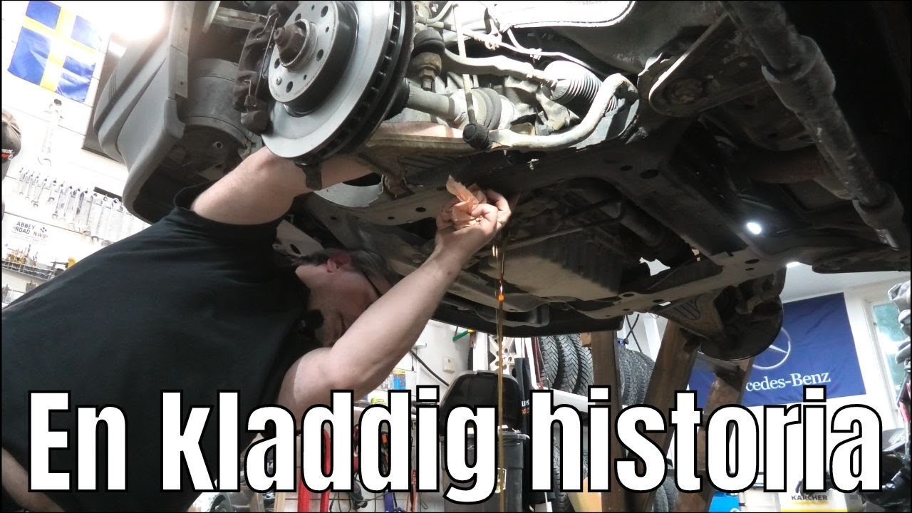 Byter växellådsolja och tändstift på Volvo 850.
