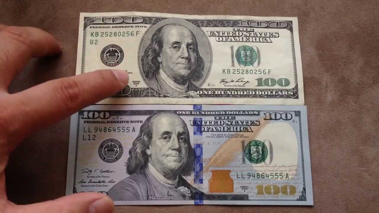 Comparing the new $100 US dollar (Oct 2013) with the old $100 bill.