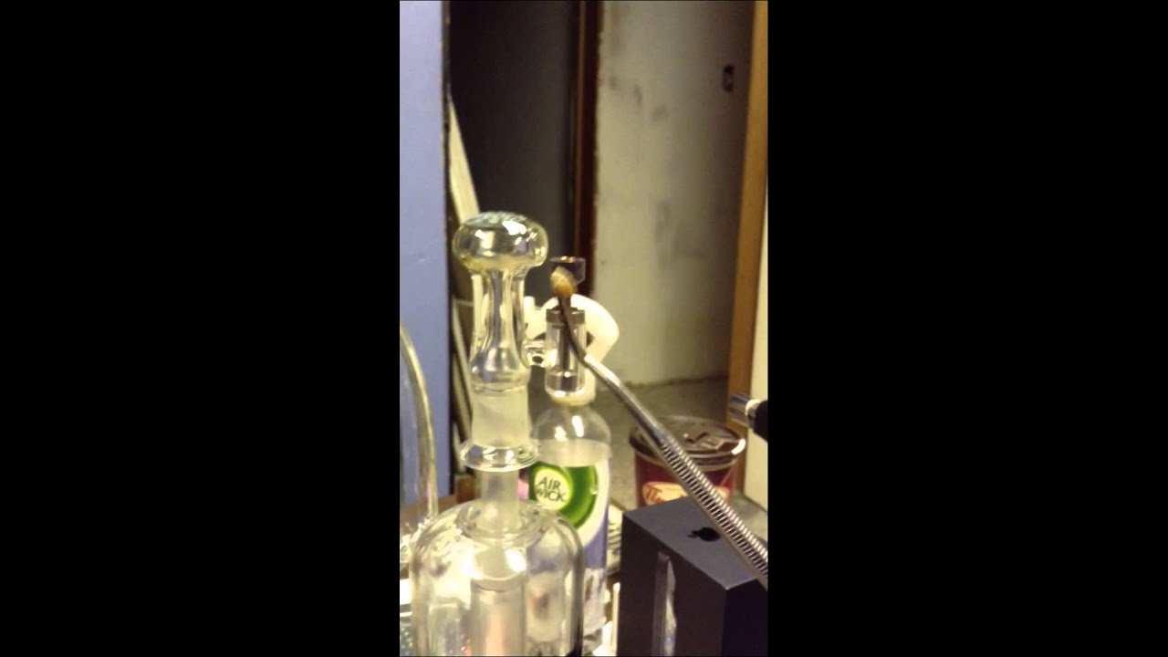 Wax Budder hoots out of titanium RIG and BENT GRiD PERC