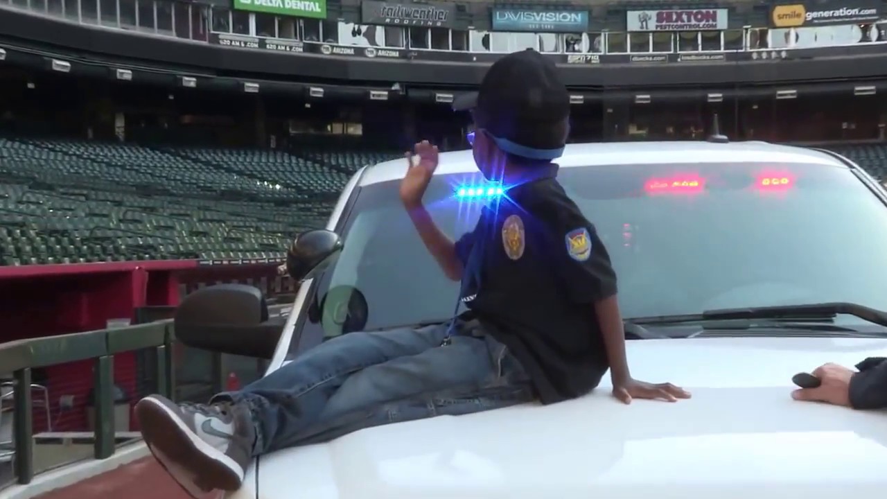 Darrius receives his wish to become a police officer from Make-A-Wish Arizona