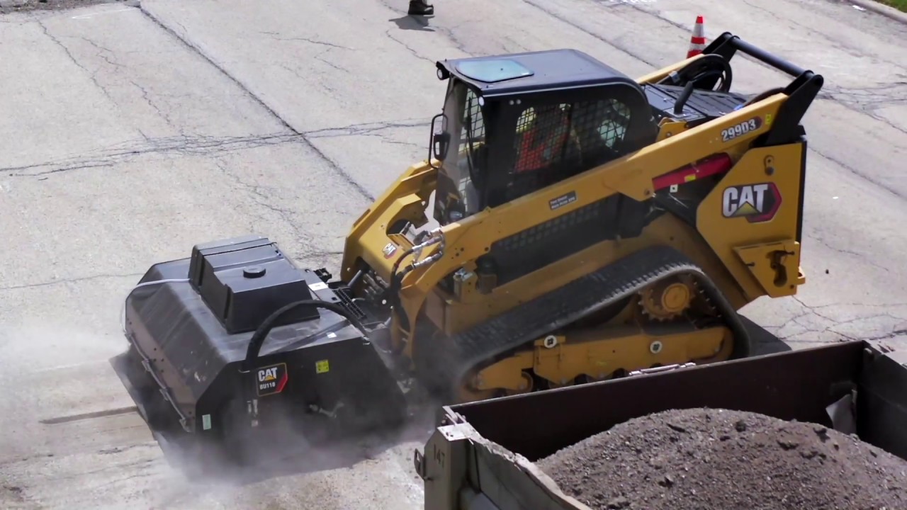 Cat&reg; Utility Broom at Work