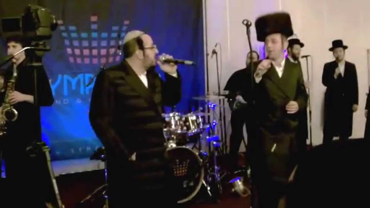 Lipa schmeltzer rocking with his nephew Sruly Green at a Family wedding