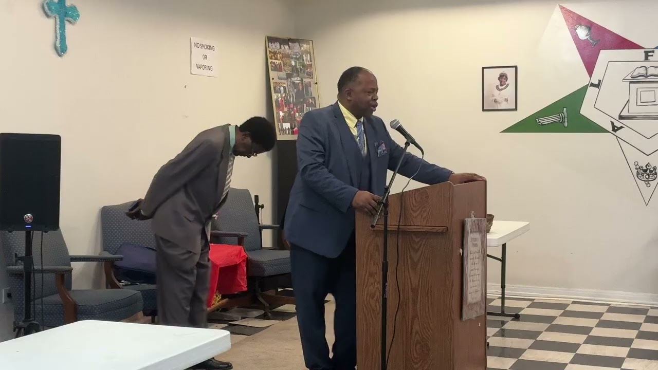 Alter Prayer ; Pastor Paul Smith praying