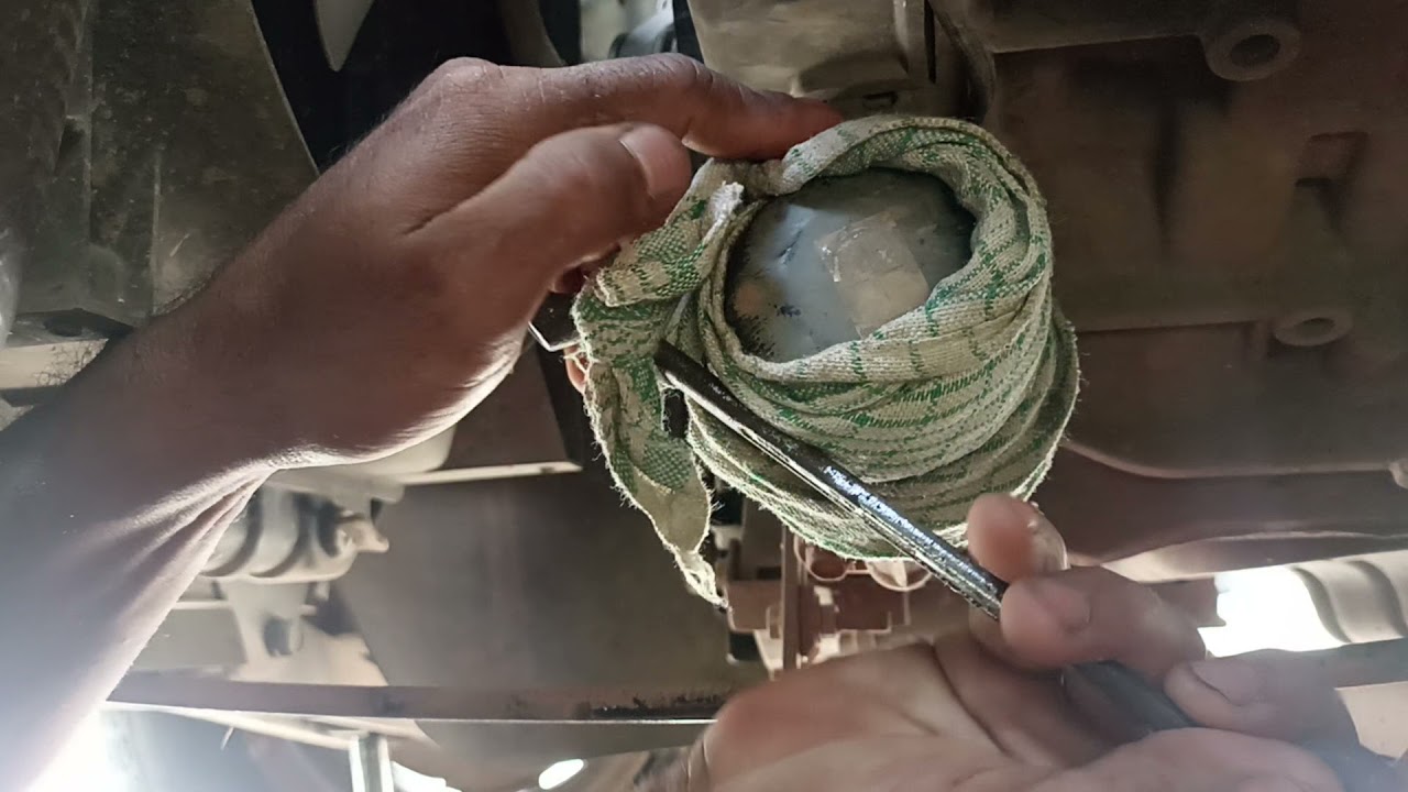 cara mudah membuka atau melepas filter oli daihatsu zebra dengan alat sederhana