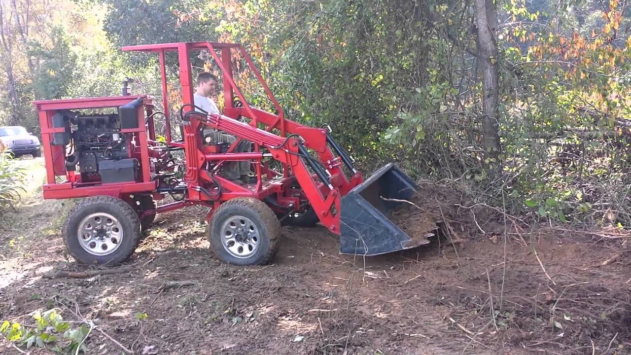 Articulating Tractor Front End Loader Clearing Brush - Homemade wheel loader