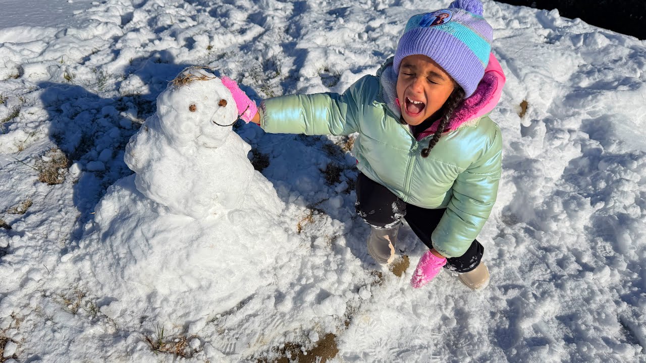 Our First Time Building A Snowman ☃️