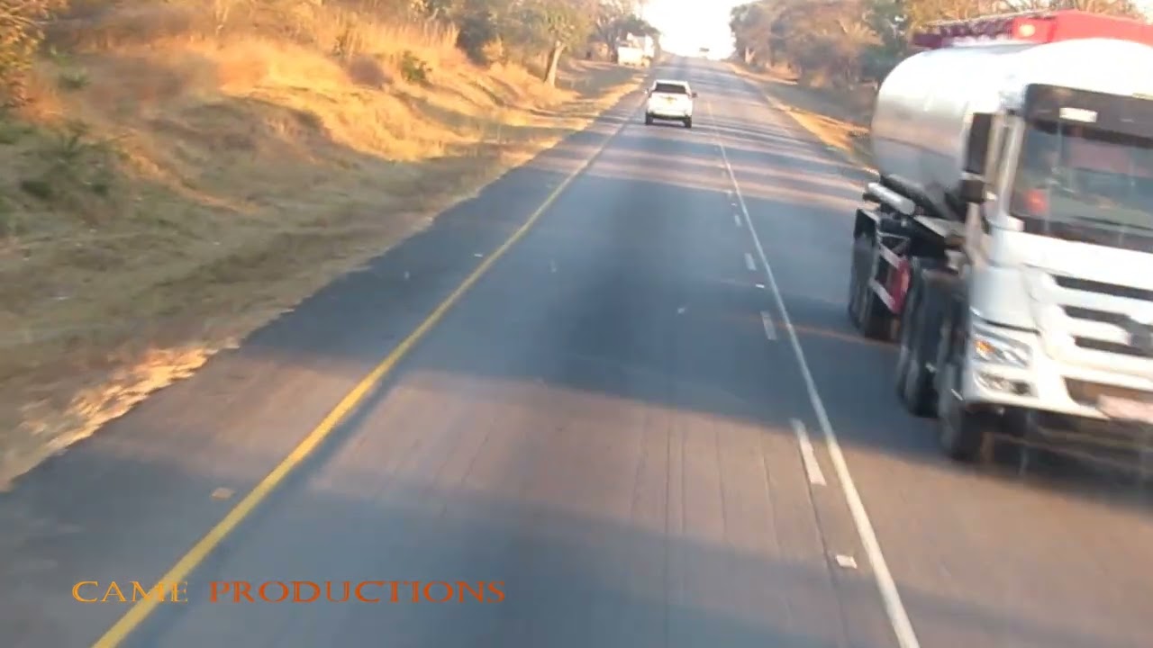 DRIVING FROM THE CITY OF MUTARE TO RUSAPE TOWN IN MANICALAND PROVINCE, ZIMBABWE