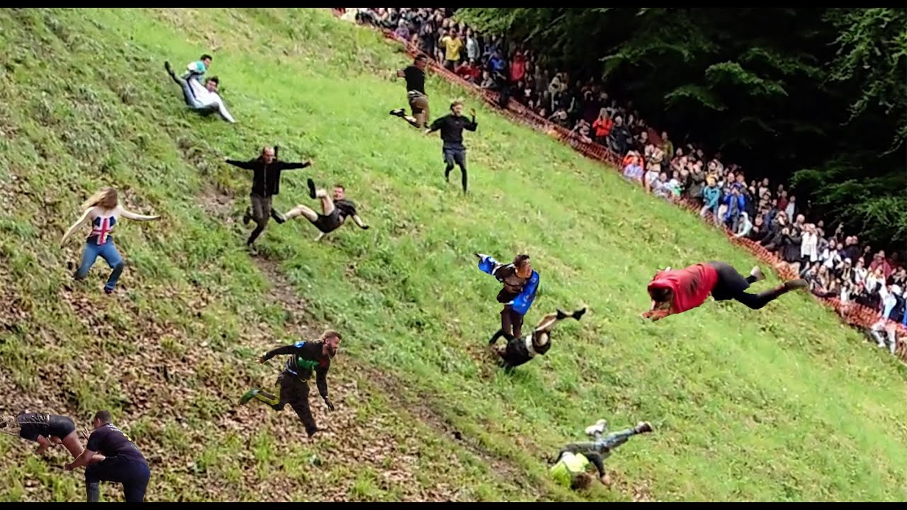 Cheese Rolling Race 2024: Strange Village festival Cotswolds UK