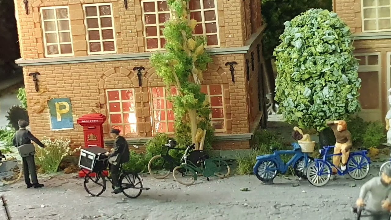 De landelijke en dorpse sfeer rond het spoor. Nederland in h0