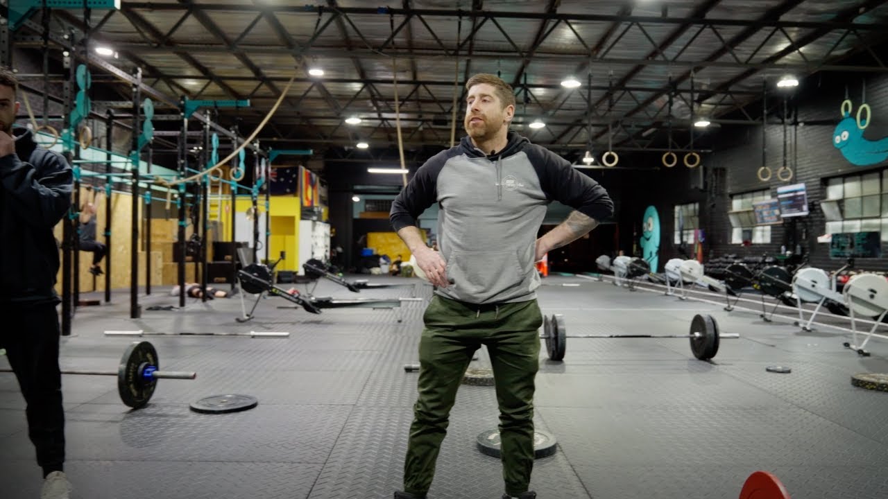 Weightlifting Coach Teaches a CrossFit Weightlifting Class