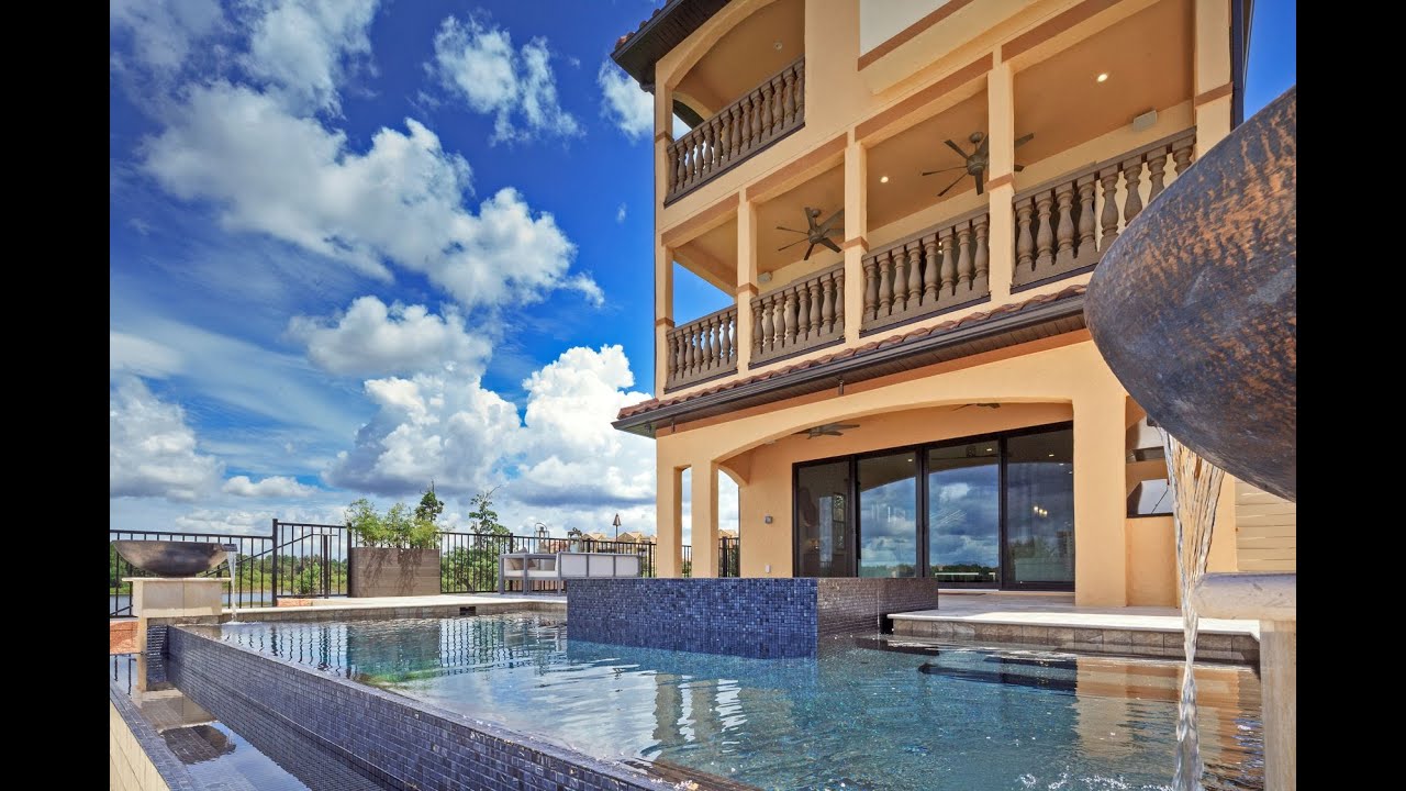 DPHLT-L Casa de Lujo $950,900 vista al lago 6h 6b Casas en Orlando Florida