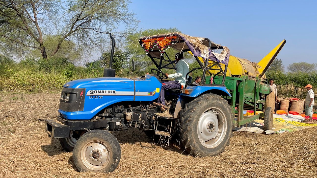 Surjeet Thresher 4 Fan 775 RPM with Sonalika Tractor | Quick Paddy Cutting | Tractor Video
