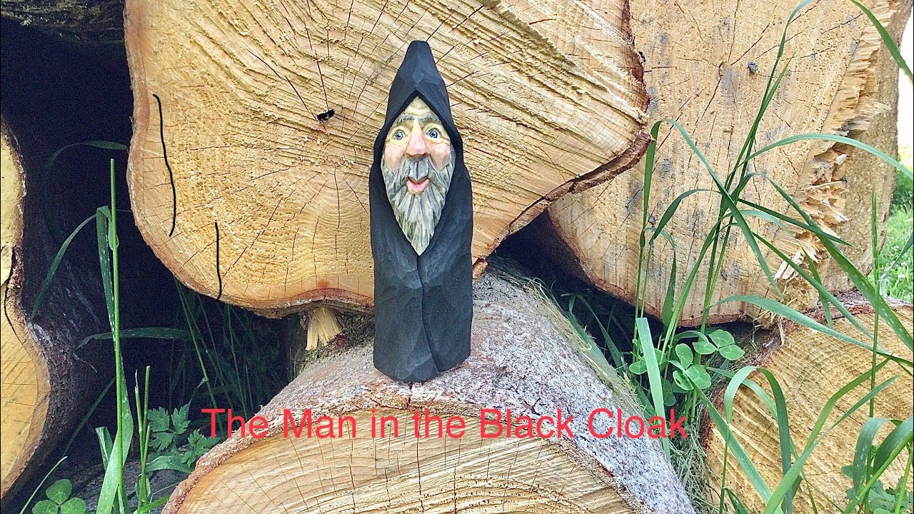 Whittling the Man in the Black Cloak