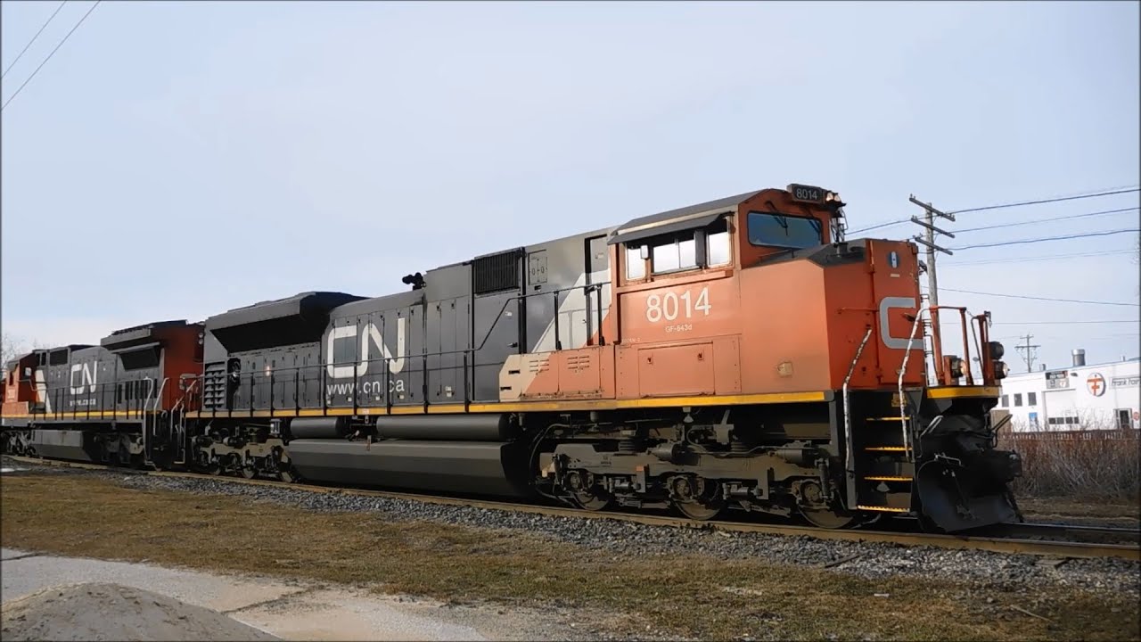 CP and CN Trains Clickety-Clacking Through St Boniface in Winnipeg, Manitoba (03/22/2016)