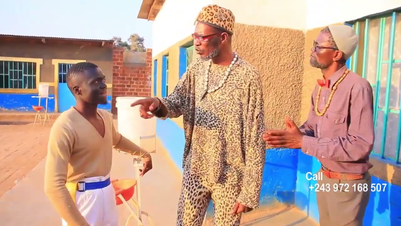 NABOU FLAMME FACE A SON FILS ET SHAMBUYI KUISU DIRECTEUR
