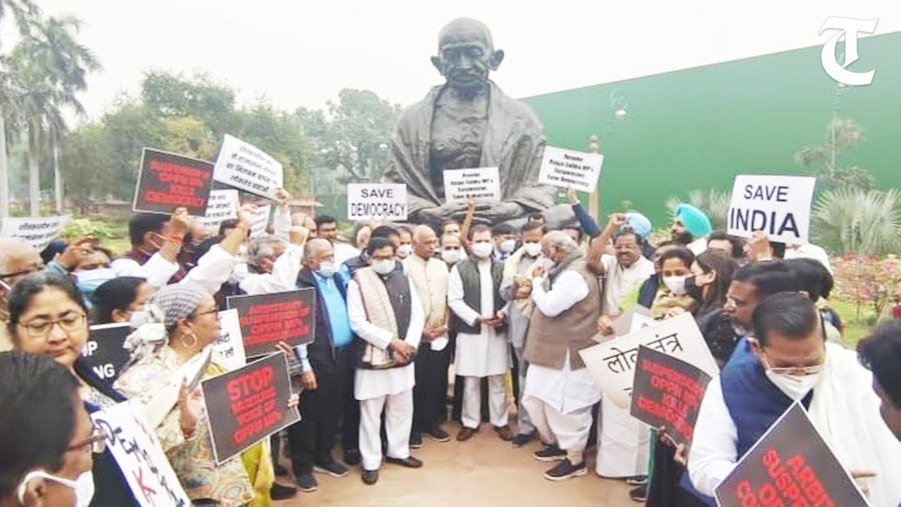 New Delhi: Opposition MPs protest outside Parliament demanding revocation of 12 suspended MPs