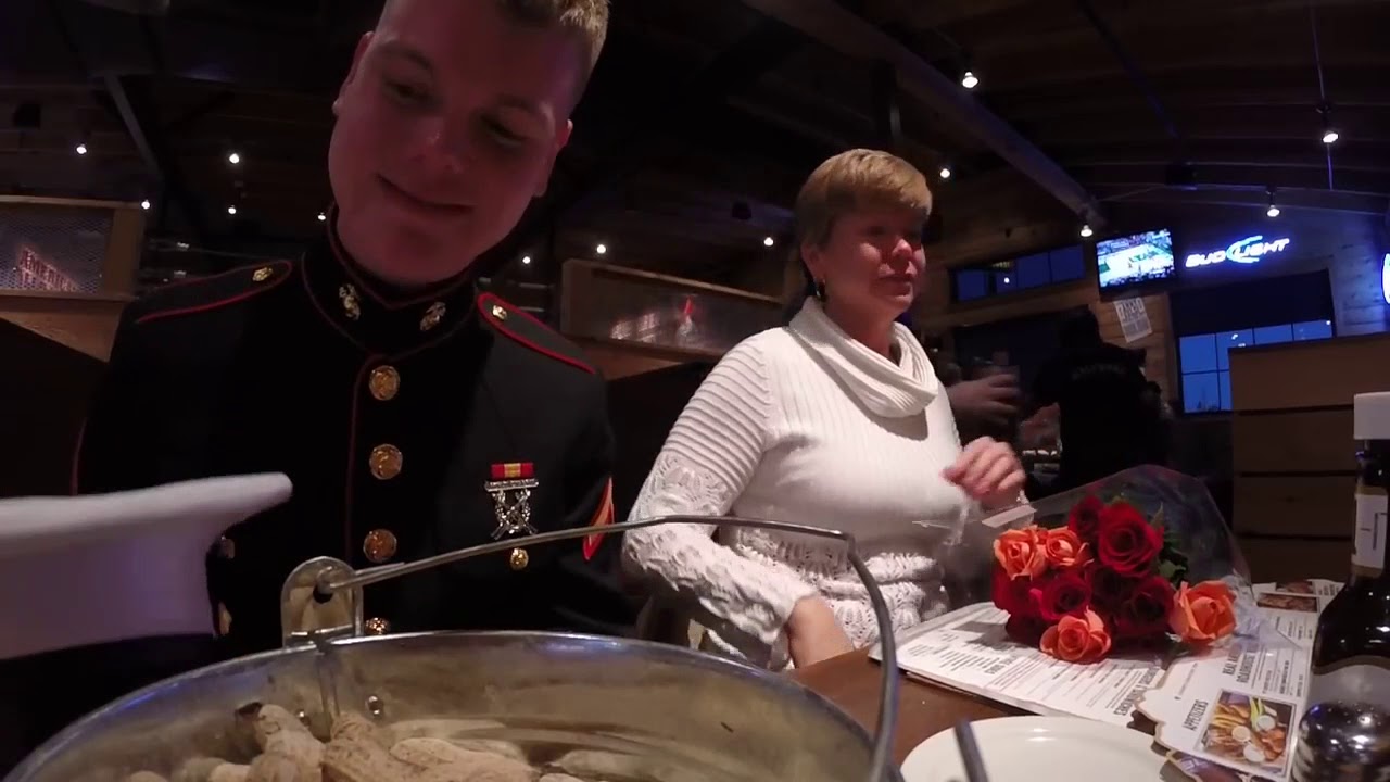 Marine surprises parents at dinner!
