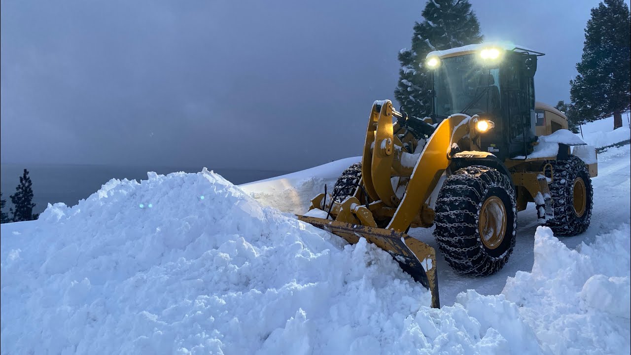 MASSIVE SNOW BANKS of Lake Tahoe! - March 2023 - CAT 938M PUSHING
