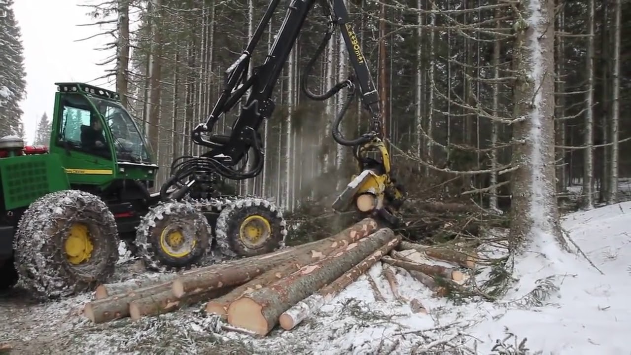 работа в лесу John Deere 1470D