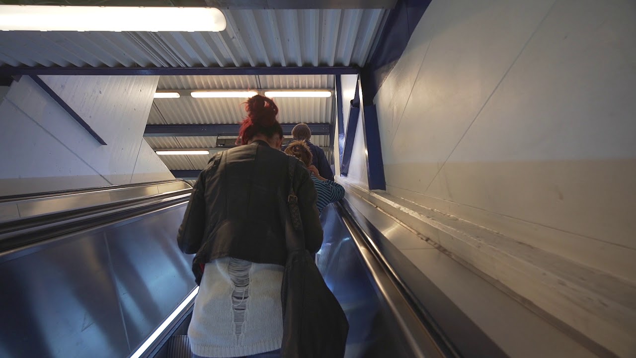 Sweden, Stockholm, Handen railway station, 2X escalator - going up to street level