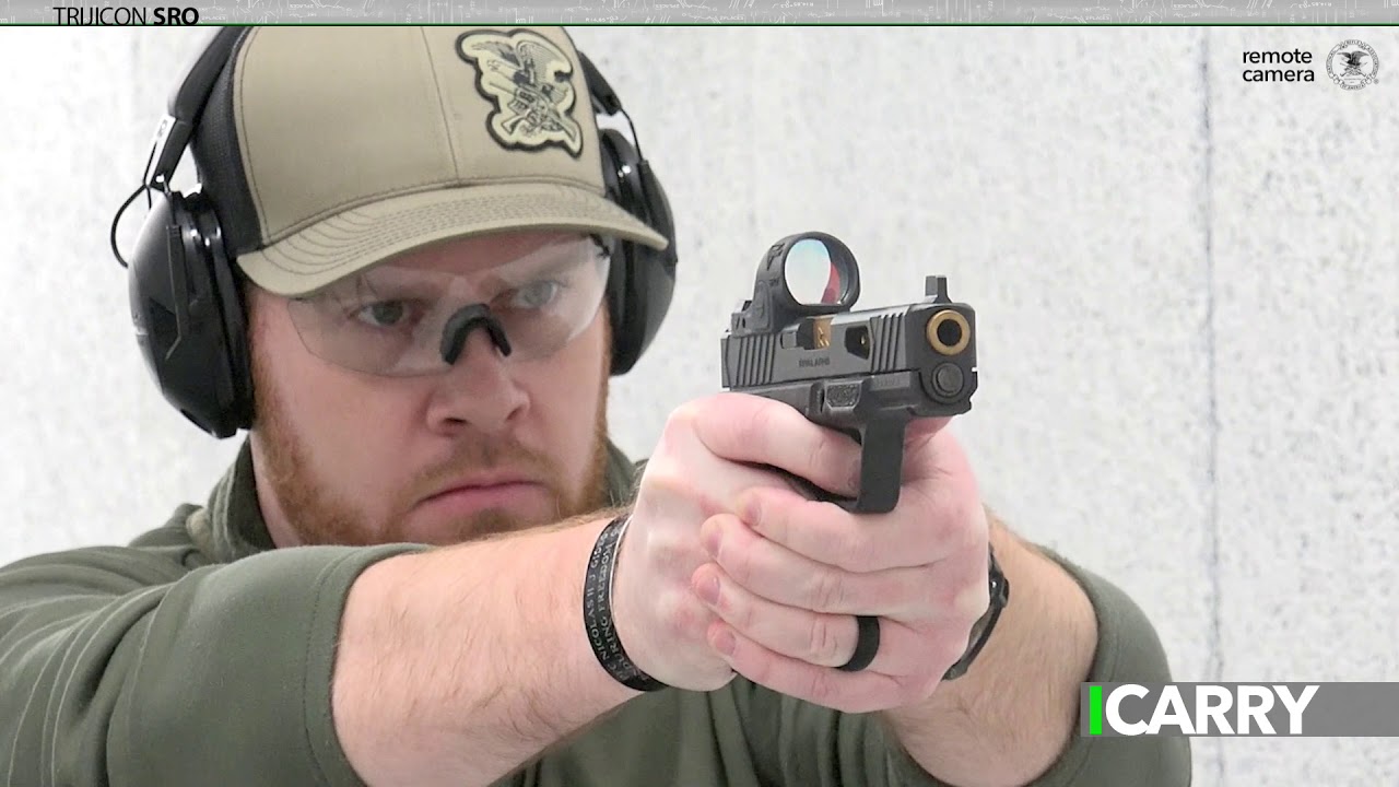 I Carry: Nomad9 Serialized Frame with Rival Arms Slide and Trijicon SRO in a JM Custom Kydex Holster