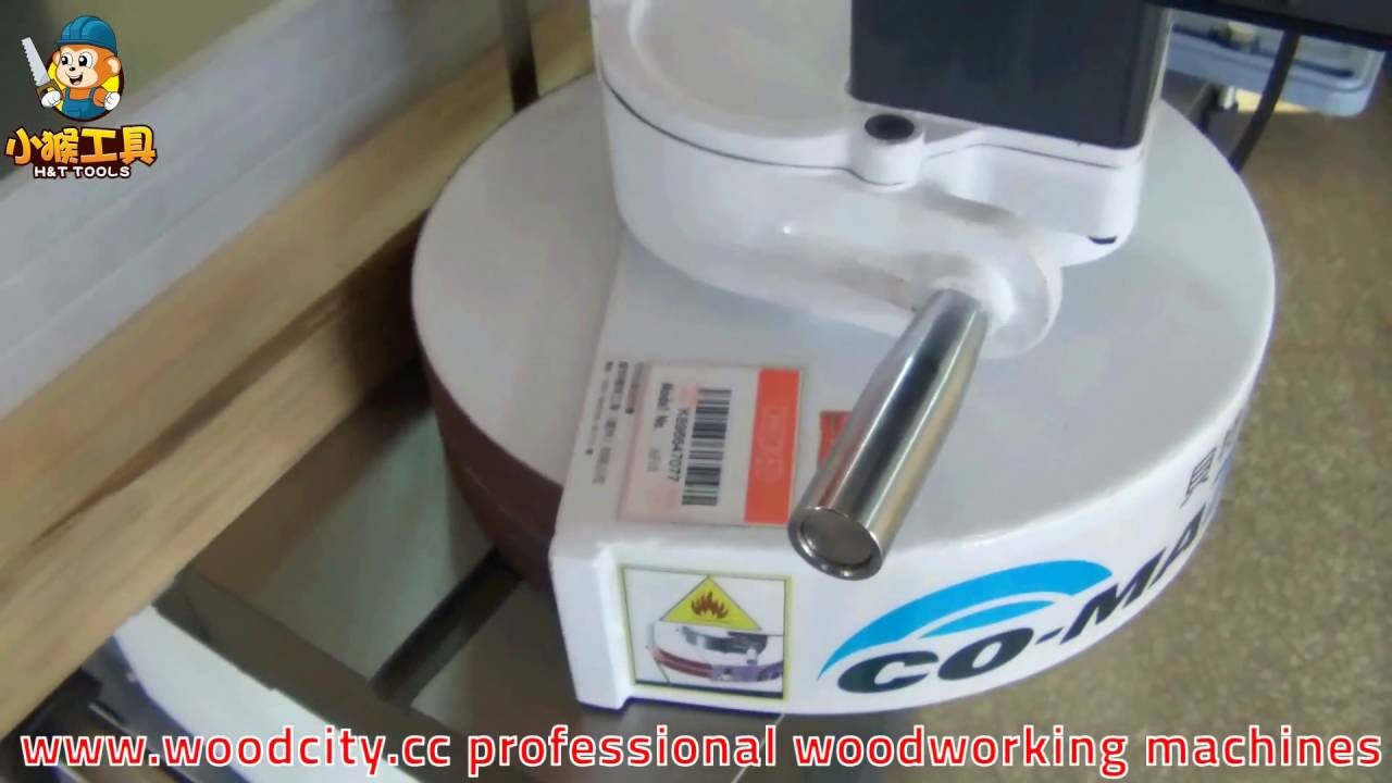Woodworking band saw with Co-matic feeder