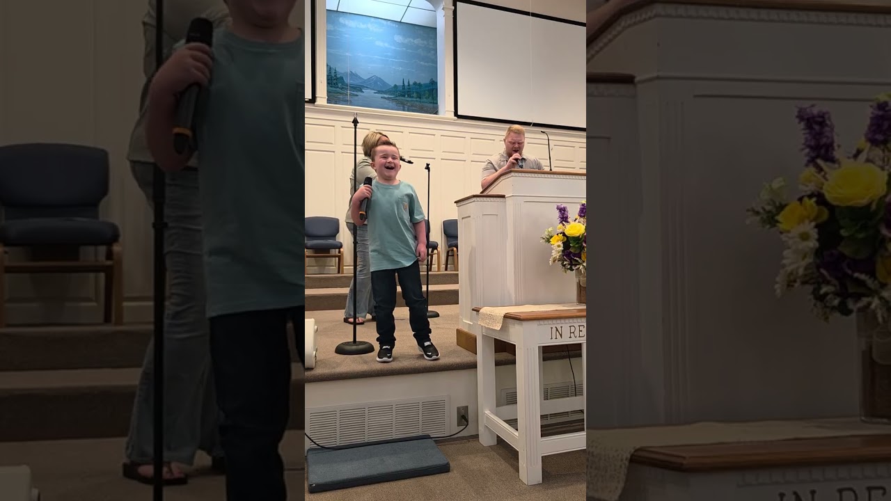 Child praising the Lord through song!   