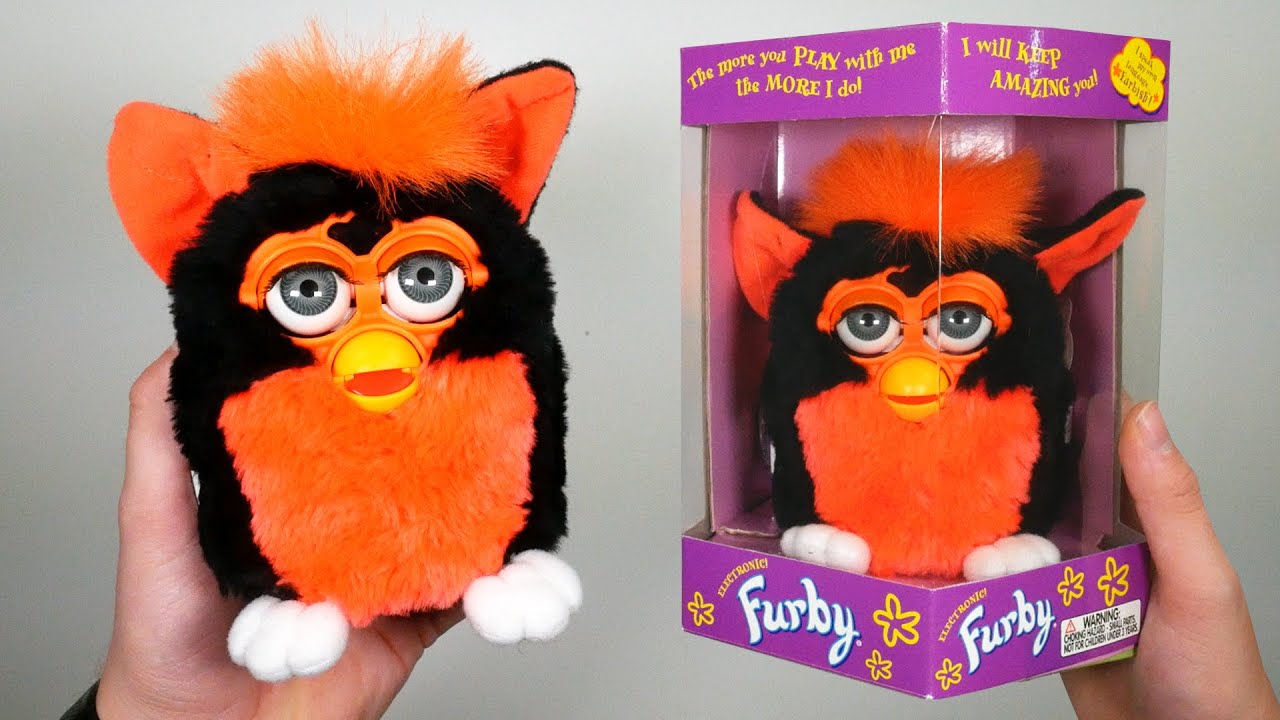 Распаковка оригинальной запечатанной игрушки Ферби 1999 года