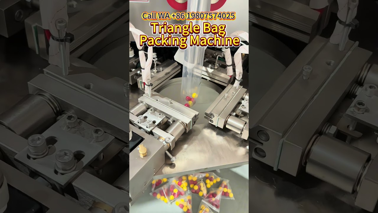Triangle bag packing machine，suitable for packaging chocolate balls，candy ，grain，snack #machine