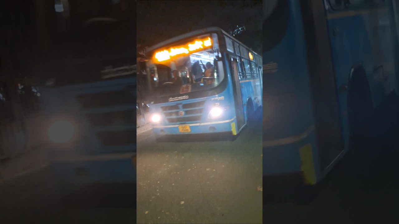 Two BMTC busses chaising each other 