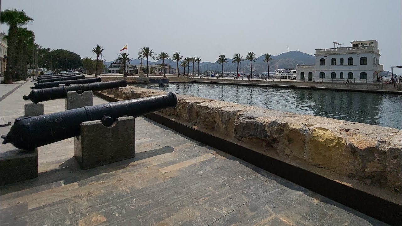 Walking along yachts and galleras port, promenade and center streets. Cartagena, Murcia, Spain