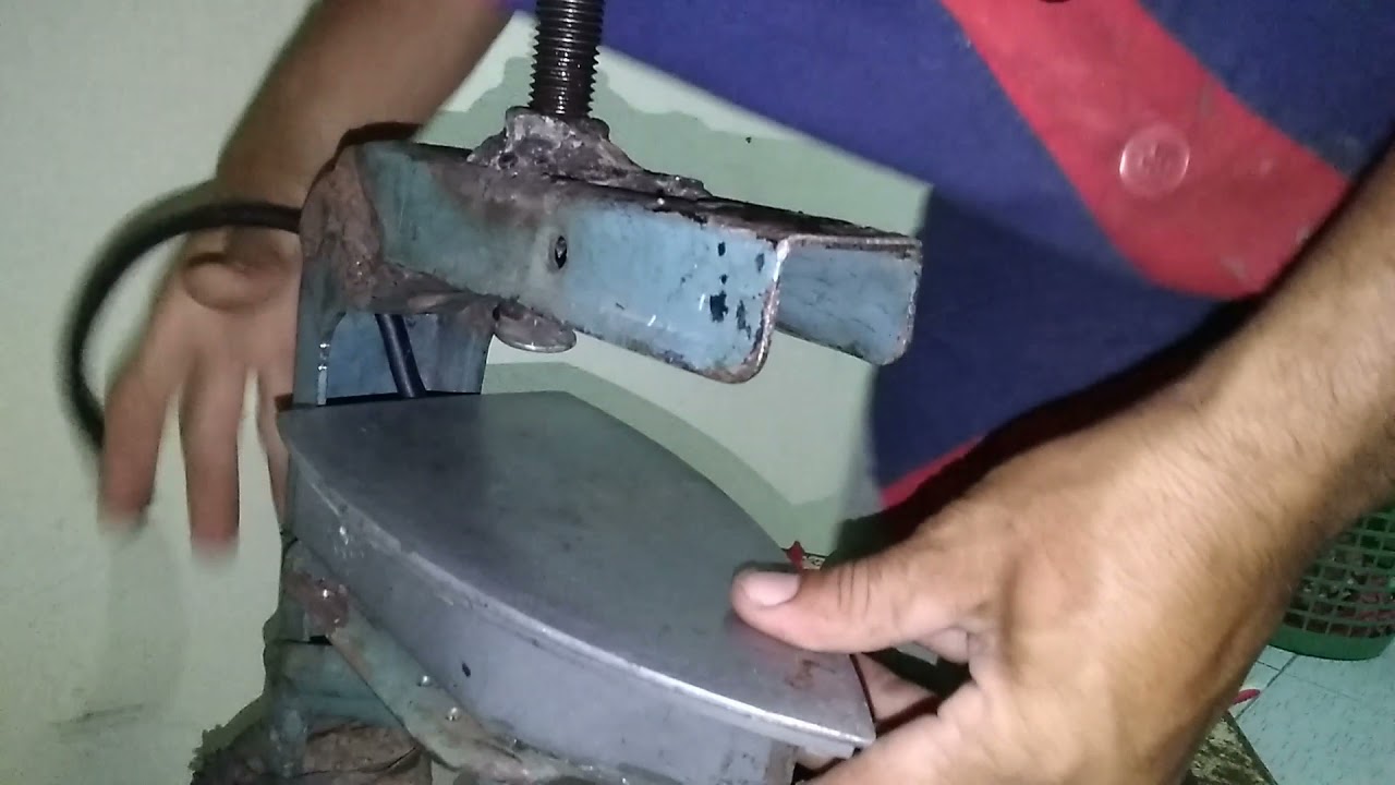 fazendo  vucanizadora para remendar camara e suporte caseiro   feito com ferro de passar roupa