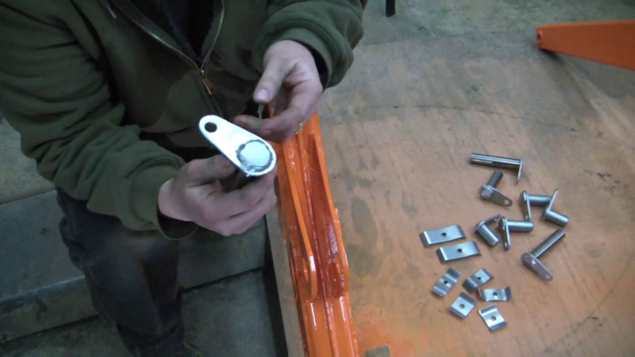 Repairing A Broken Loader Arm With New Pins And Bushings