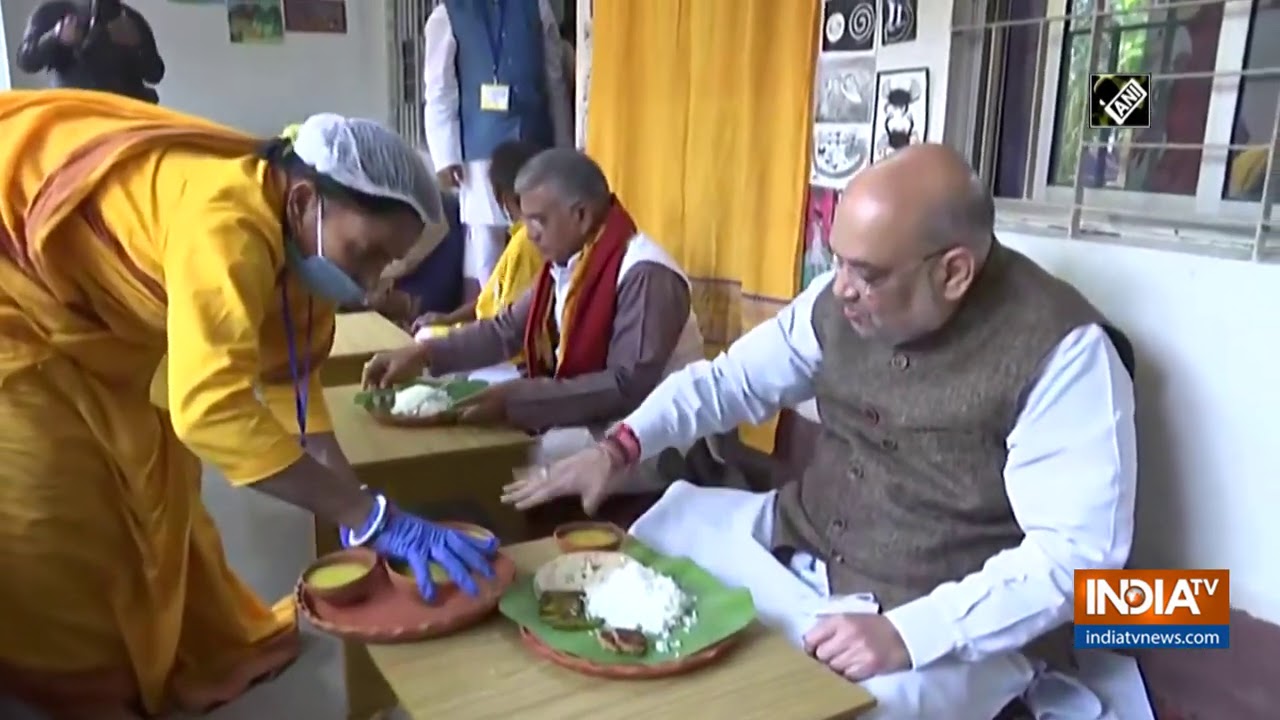 Home Minister Amit Shah eats lunch at Baul singer's residence