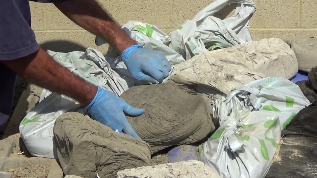 EASY DIY Making Concrete Rocks Recycling For Holding Pond Liner in Place Or Garden Edging