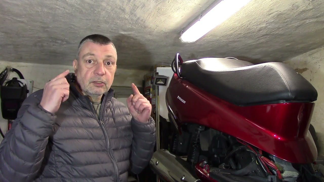1 Teil/Peugeot Elyseo 125 ( Kassler Roller ) Hinterrad + Nebenschwinge runter nehmen + Auspuff..