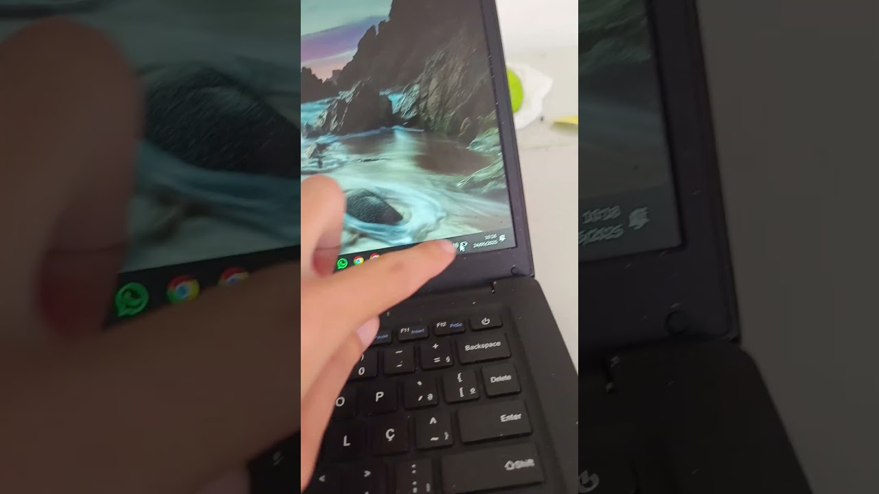 como diminuir e aumentar o som do notebook