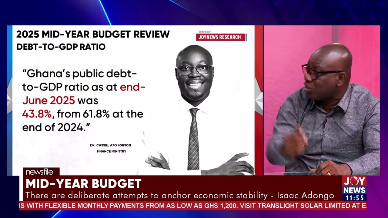 Kwadwo Poku and Isaac Adongo in a heated exchange over the mid-year budget review. 