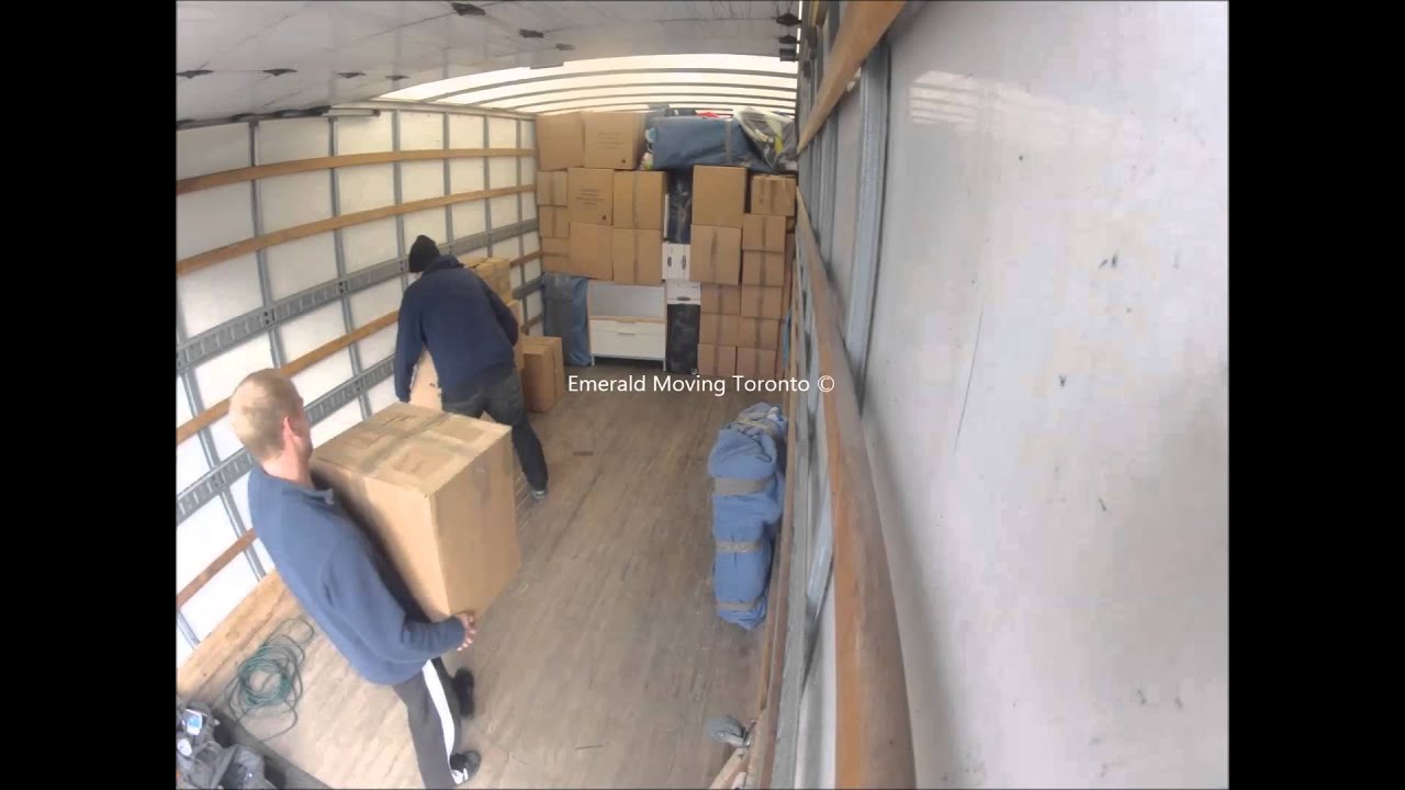 Emerald Moving 3 Man Crew loading a 26' truck