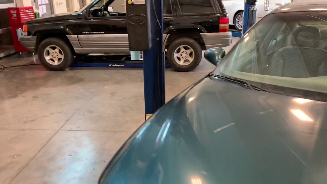 How to use a 2 post asymmetrical lift to raise a car.