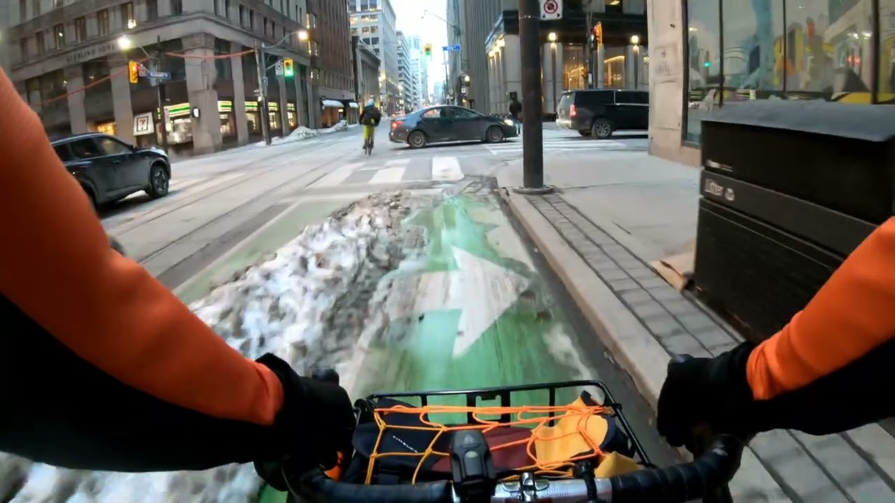vid465 - clear streets, snow-filled bike lanes