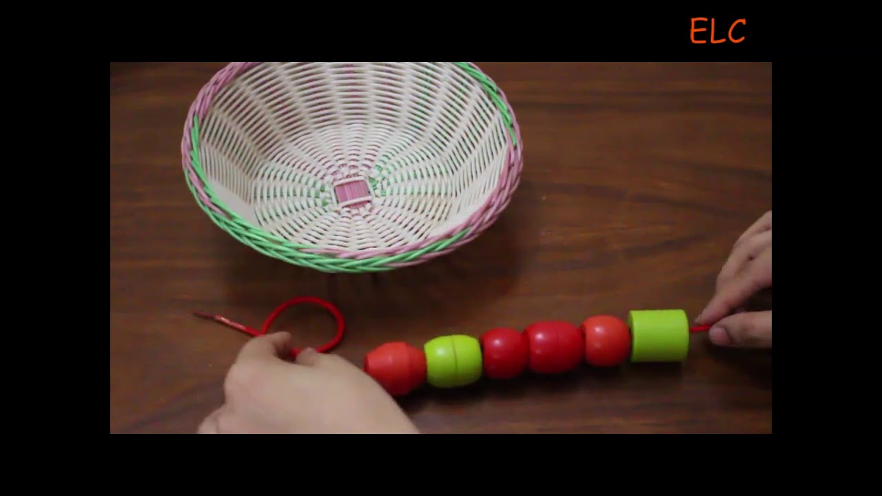stringing beads/Montessori activities
