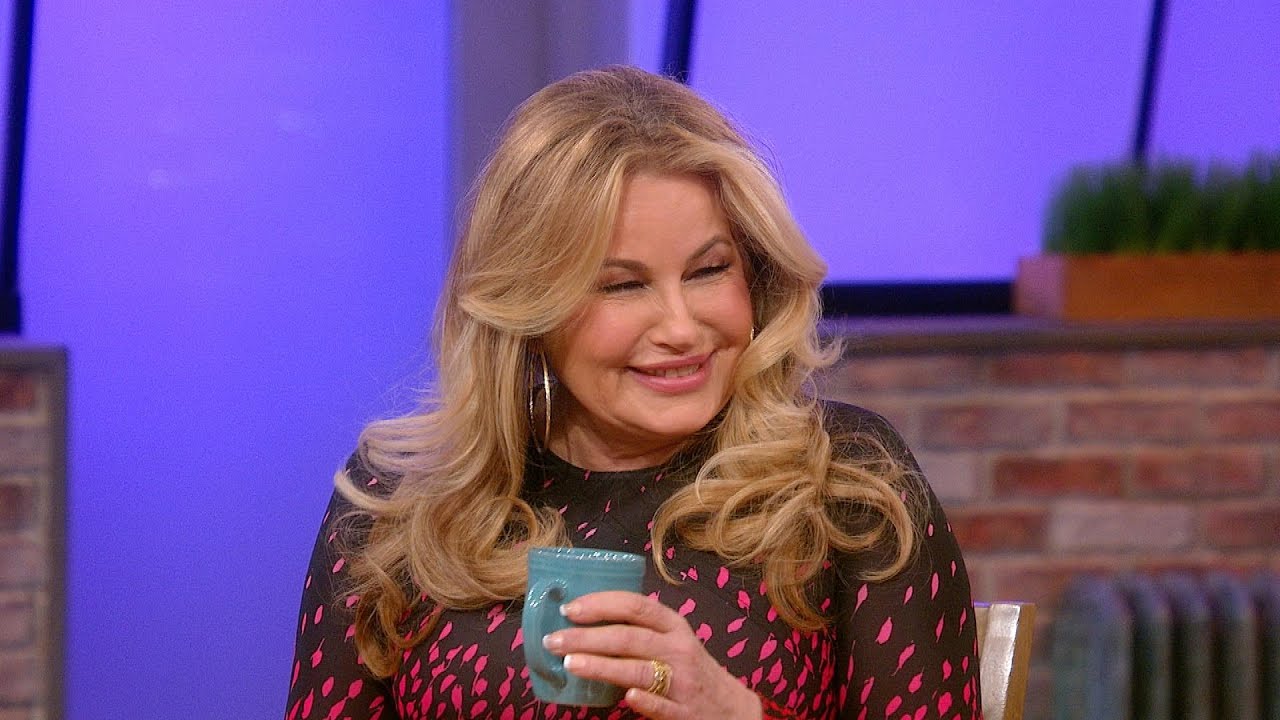 Jennifer Coolidge Tells Hilarious Story Of Being Fired Through a Bathroom Stall Door