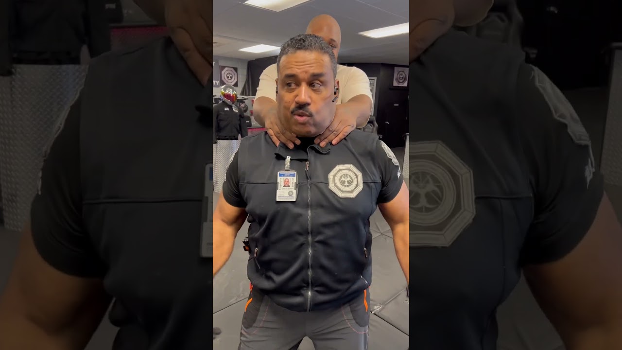 Rear neck grab escape
