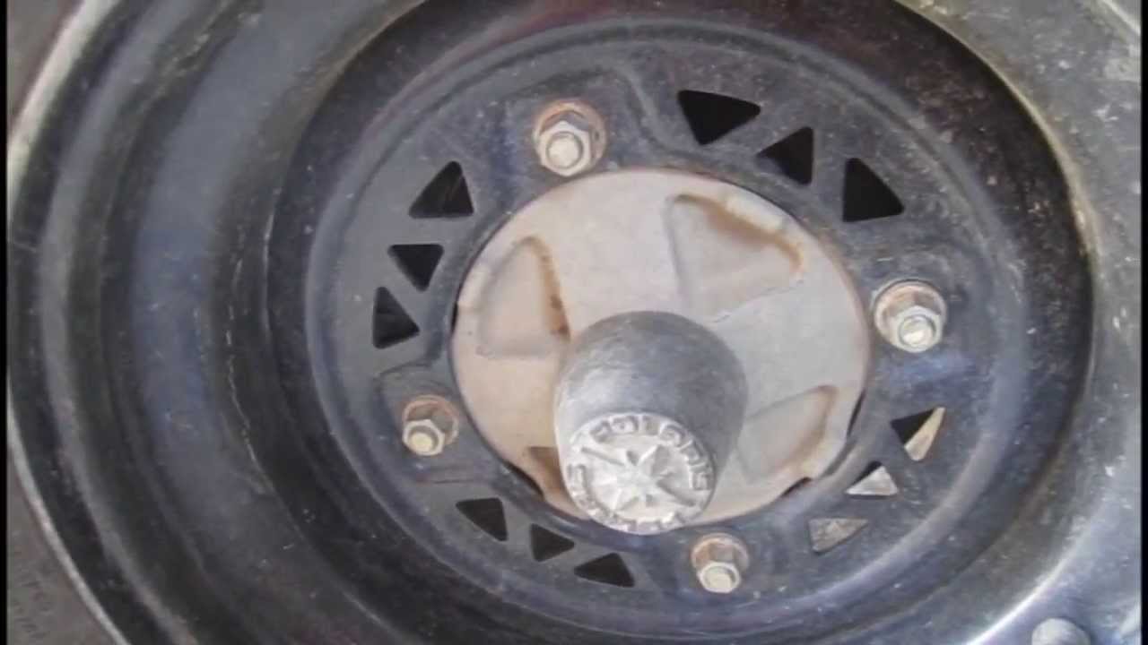 Polaris Sportsman Rear Wheel Bearing Removal - DIY ATV Rear Axle Bearing Replacement Part 1