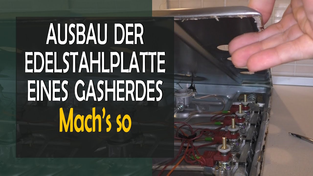 Ausbau der Edelstahlplatte eines Gasherdes