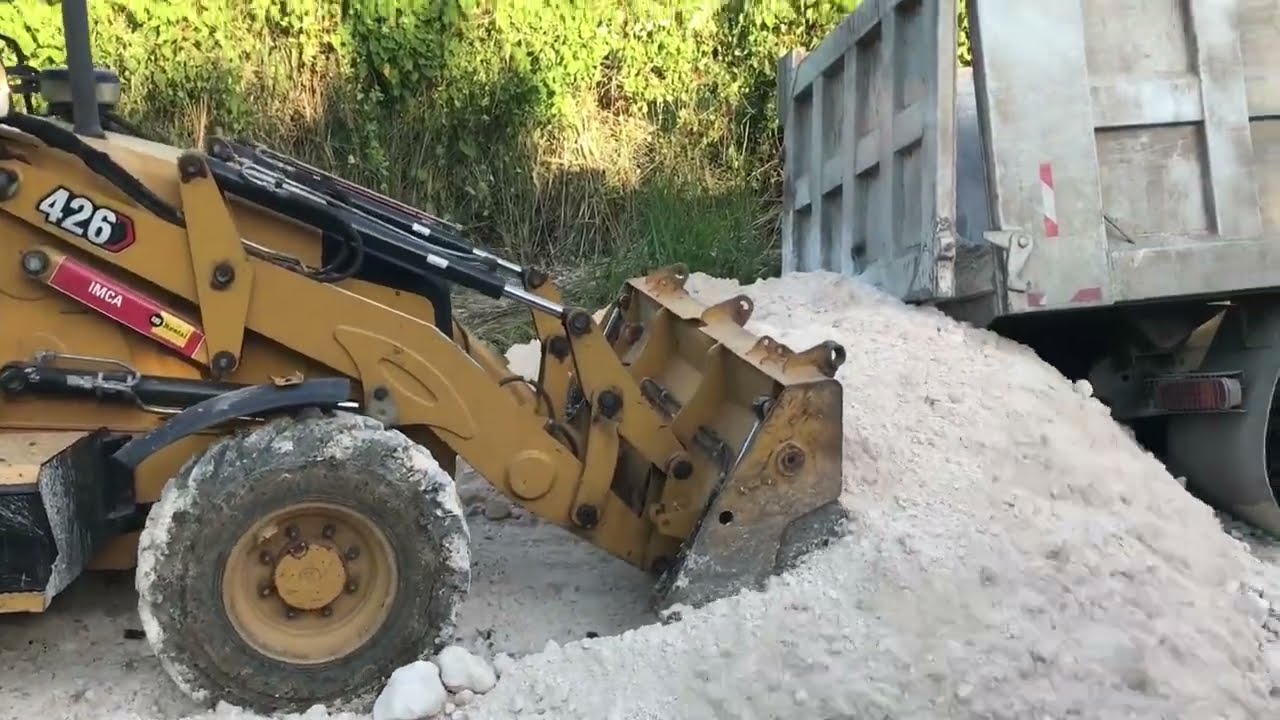 Road Rehabilitation Programme Dumper Truck Stuck And The Barking Lodge Road To New Pera. St Thomas.